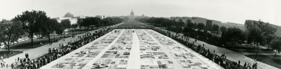 An image of the quilt being displayed in Washington, DC around 1987. Image taken from National AIDS Memorial.